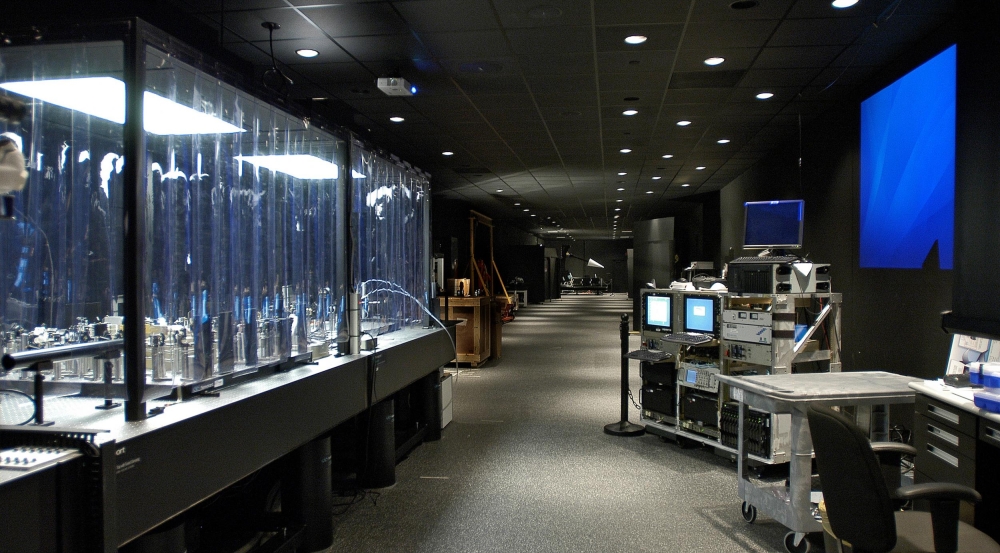 The ladar system on the right was integrated into the active range for testing. At the left is a cleanroom environment.