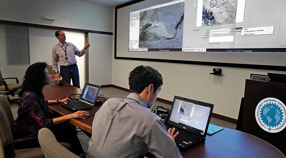 Lincoln Laboratory engineers work on multi-intelligence software integration in the ISR PED Laboratory.