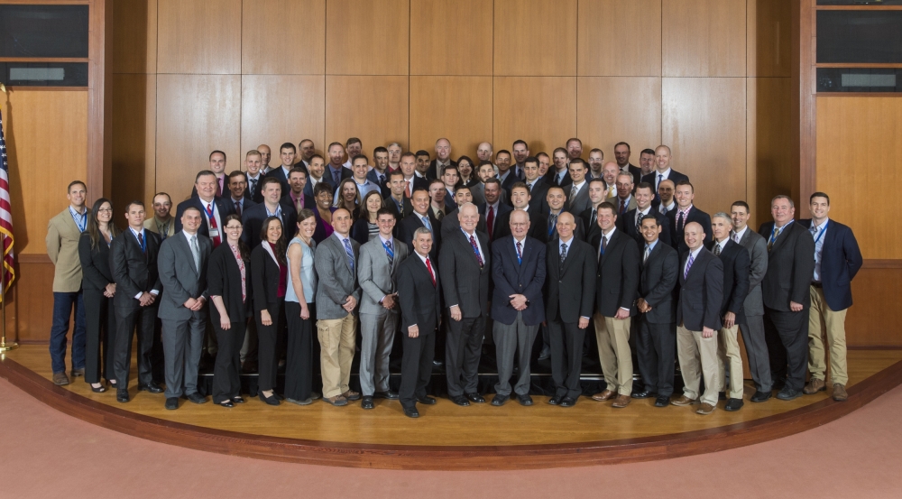 The 70 attendees of the 2017 Defense Technology Seminar with William Delaney, front center. Standing on each side of Delaney are visiting distinguished speakers Andrew Krepinevich, left, and James Baker, right. Photo: Nicole Fandel