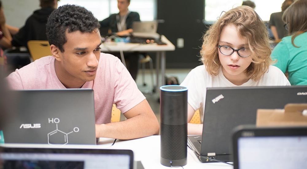 Amazon's Alexa may have a "sister" among the cognitive assistants developed by students like these in the Beaver Works Summer Institute's build-your-own-cognitive-assistant course.