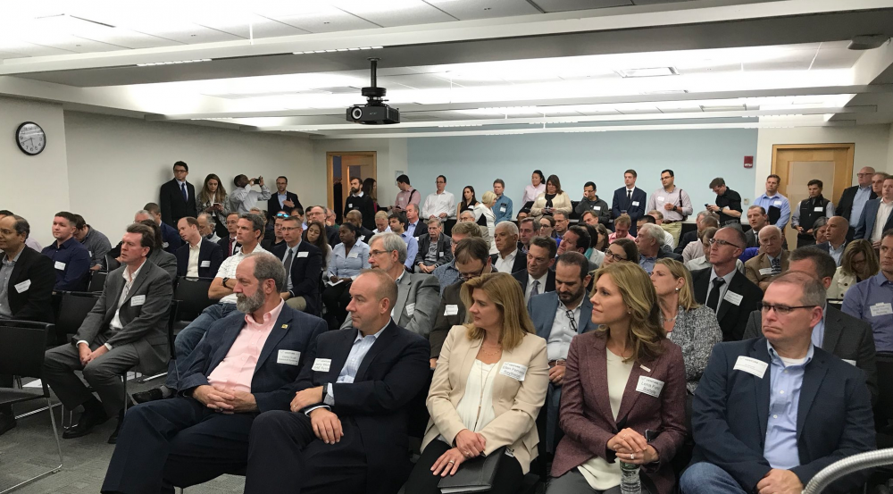 Attendees, hailing from startups, venture capital companies, DoD organizations, and non-profits, packed the room to hear two panel discussions before breakout sessions in the Venture Café.