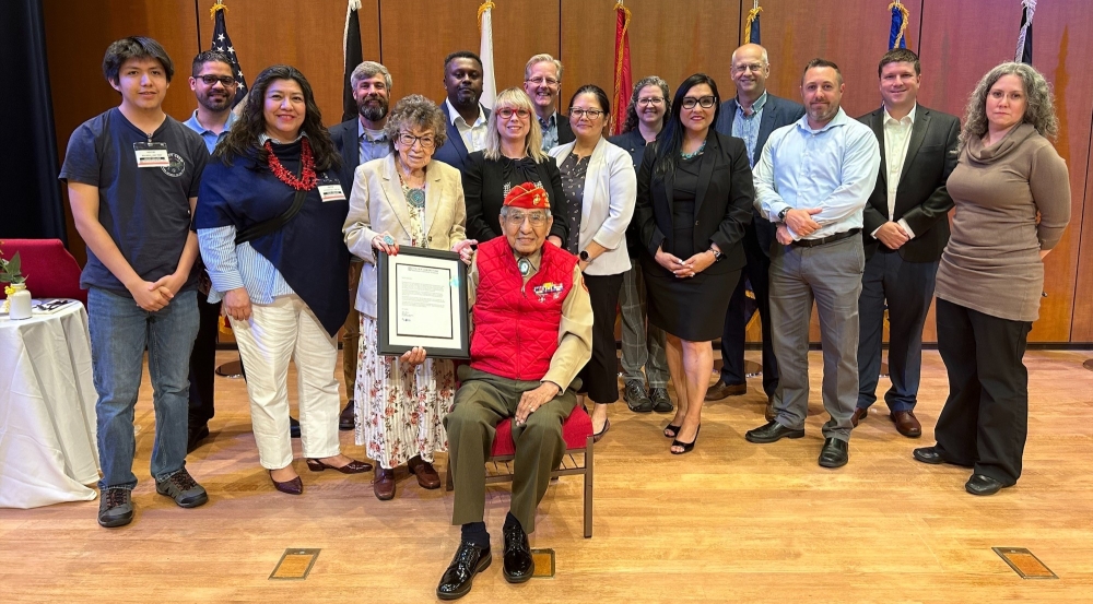 Peter MacDonald and his family gather with employee resource group members, CTNS organizers, and ODI staff who helped organize the event.