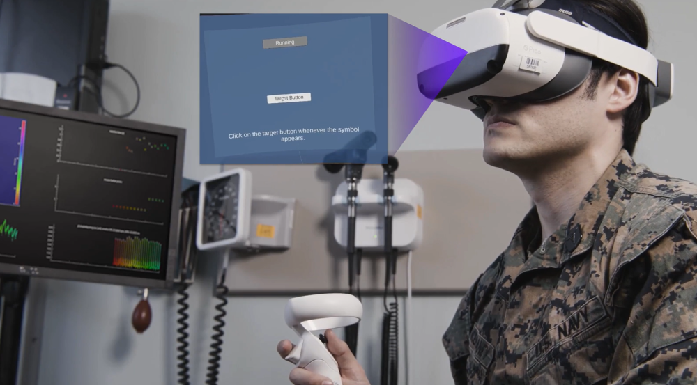 A still from a video showing a service member sitting in a medical setting and wearing a VR headset with the MINDSCAPE application installed.
