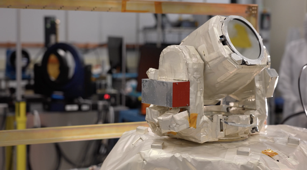 A laser communications terminal is wrapped in insulation. 
