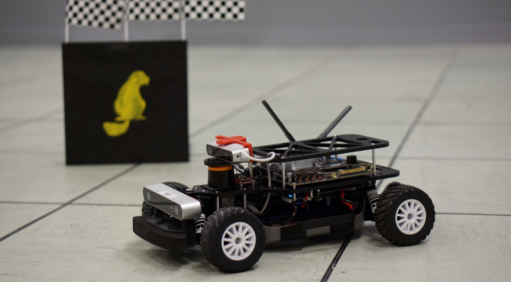 Students in the Autonomous RACECAR Grand Prix course program the software to control the camera, lidar, sensors, and embedded processing for the robot pictured.