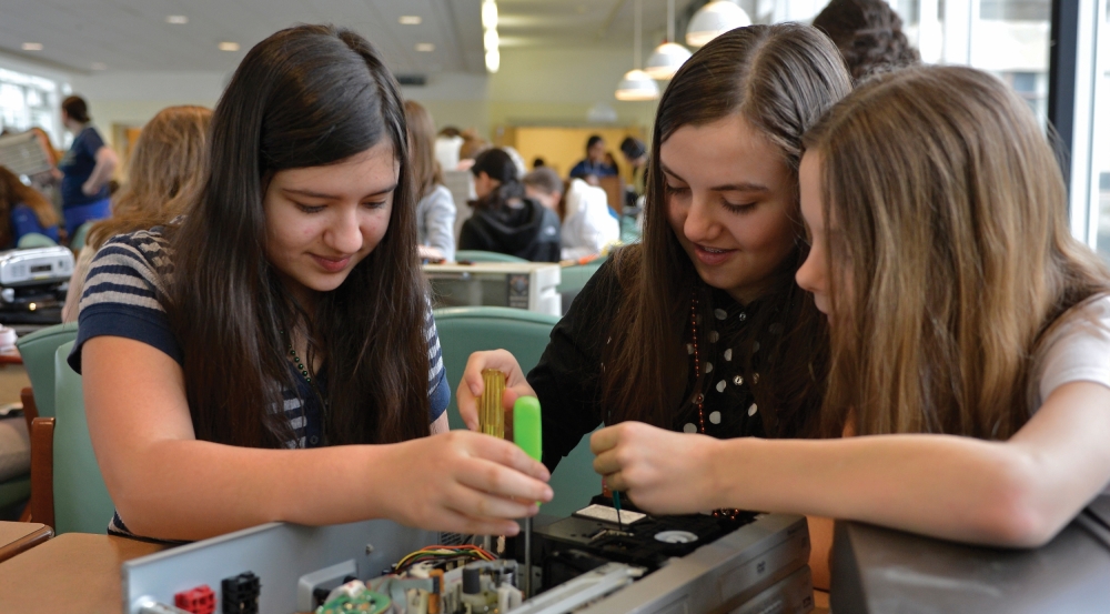 Our "Wow! That's Engineering!" workshop for girls offers a reverse engineering station where the girls disassemble a variety of electronics to see how the parts of a machine are connected.