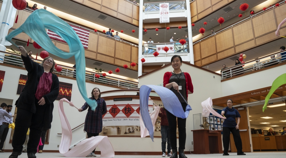 Laboratory employees participate in a Chinese ribbon dance demonstration for the annual Lunar New Year Celebration.