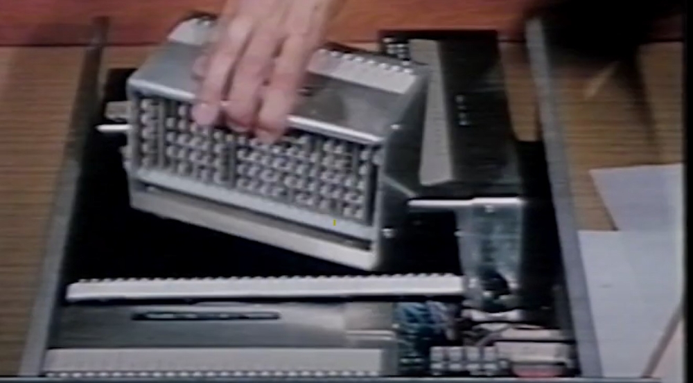 The Tactical Transmission System (TATS) is shown up close.