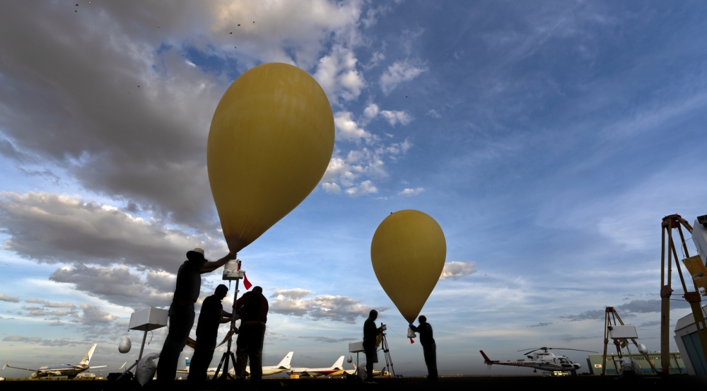 Photo of researchers launching the weather balloons