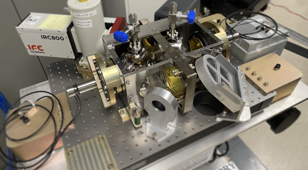 A photo of hardware on a lab bench. 