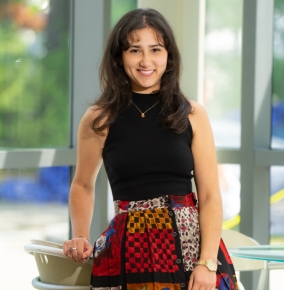 A portrait photograph of Ashley Kamal. 