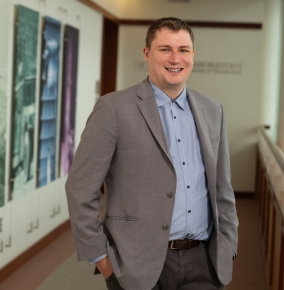 A portrait photograph of Ian DeTore.