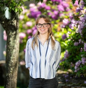 An outdoor portrait photograph of Emma Kotar. 