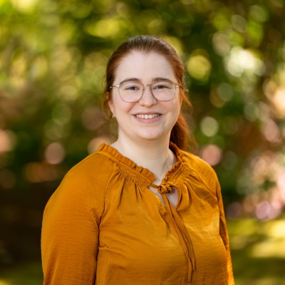 An outdoor portrait of Grace Remillard.