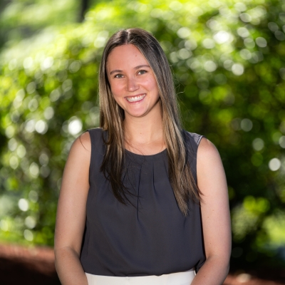 An outdoor portrait photograph of Ashley Arroyo. 