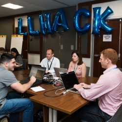 During the two-day hackathon, staff were challenged to quickly train and test machine learning algorithms to detect fake media content. Photo: Nicole Fandel