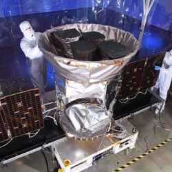 Staff from the Laboratory and the aerospace company Orbital ATK inspect the satellite in Dulles, Virginia, prior to shipment to the Kennedy Space Center for launch vehicle integration. The four cameras can be seen inside the sunshade. Photo: Orbital ATK