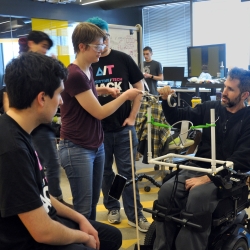 Alex Rosenberg works with his team to create a technology to play catch with his sons. Photo: MIT Assistive Technology Club Alex Rosenberg works with his team to create a technology to play catch with his sons. Photo: MIT Assistive Technology Club
