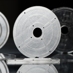 three disc-shaped microfluidic device that were 3D printed