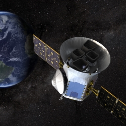 Illustration of NASA’s Transiting Exoplanet Survey Satellite (TESS) at work. Credit: NASA's Goddard Space Flight Center