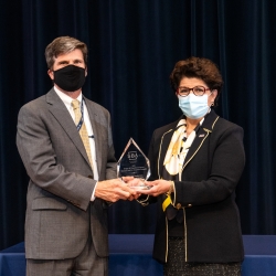 Jovita Carranza, the 26th Administrator of the U.S. Small Business Administration, presents the Dwight D. Eisenhower Award for Research and Development to Scott Anderson, Assistant Director for Operations. Photo: Nicole Fandel