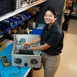 Veronica Cheng disassembles a 16-channel transmit chassis. 