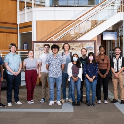 MMIP interns stand for a photo in the Lincoln Laboratory lobby.