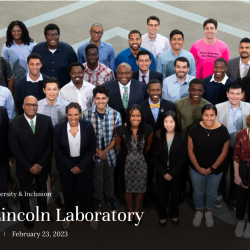 A group photo of GEM fellows posing for a photo in the MIT LL lobby. 