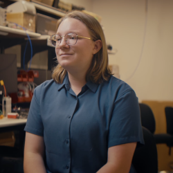 Ivy Mahncke sits in front of the camera.