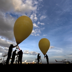 Photo of researchers launching the weather balloons