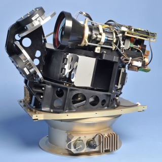 The Wide-Area Infrared System for Persistent Surveillance was named one of the R&D 100 Award winners. This interior view of the system shows its lens and the folding mirrors.