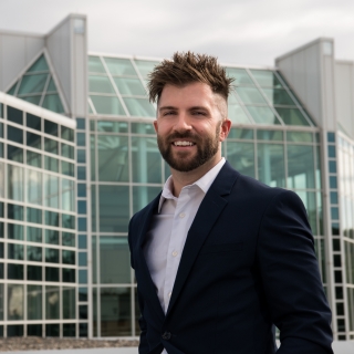 As the additive manufacturing lead at Lincoln Laboratory, Derek Straub consults with technical staff to design 3D-printed parts for various systems and technologies and oversees production on nine industrial machines. Photo: Nicole Fandel