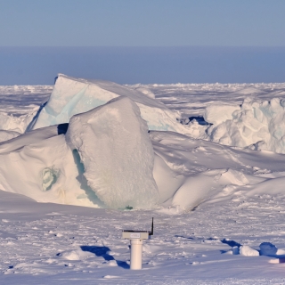 An orange cone warns ice camp participants to not go beyond this point. The Laboratory team placed seismometers on the fringes of camp and as close to ice cracks like this one as they were allowed to go.