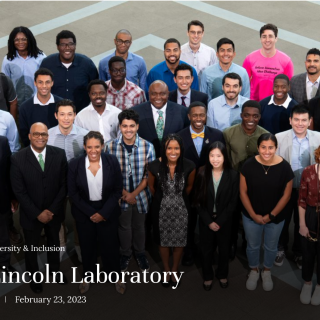 A group photo of GEM fellows posing for a photo in the MIT LL lobby. 