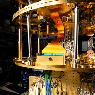 A photo of a prototype of Lincoln Laboratory's flexible cryogenic cables installed inside a dilution refrigerator 