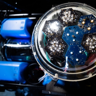 A communications device enclosed in a vessel has hexagon-structures containing sensors.