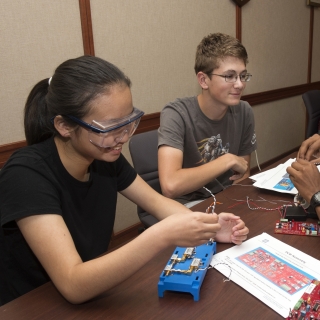 Students work collaboratively to assemble their radars in our LLRISE course. 