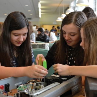 Our "Wow! That's Engineering!" workshop for girls offers a reverse engineering station where the girls disassemble a variety of electronics to see how the parts of a machine are connected. 