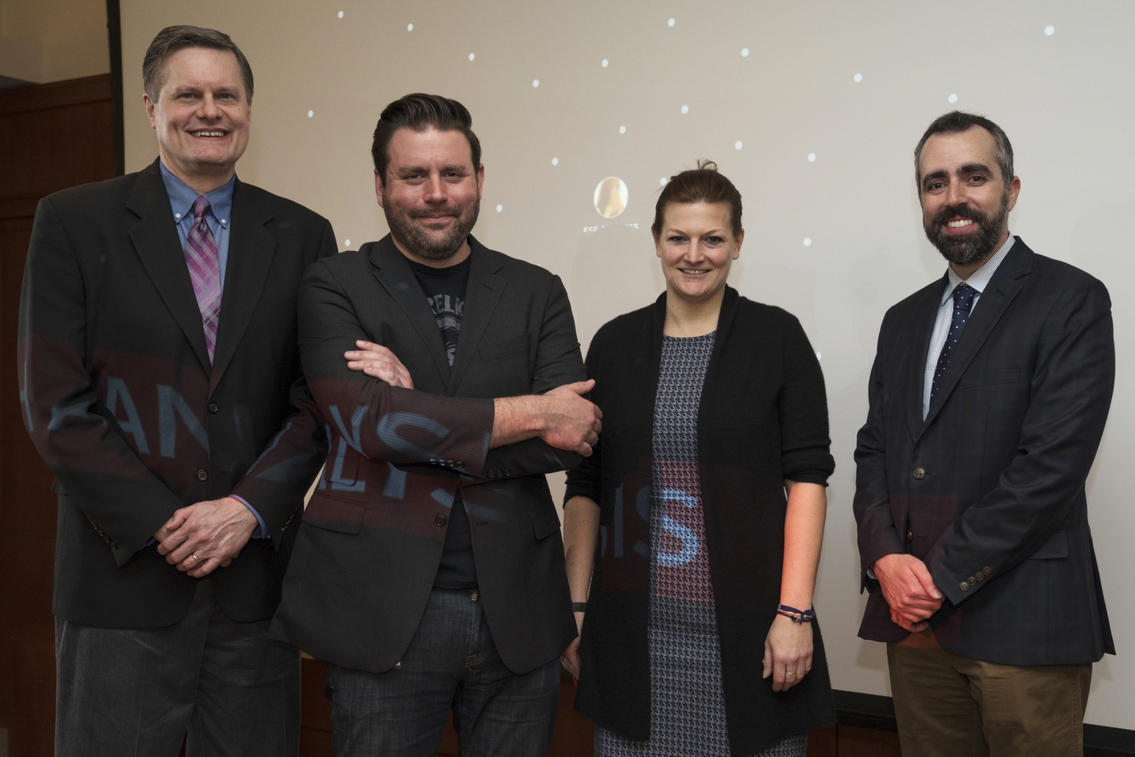 Two Laboratoy staff members are joined by Jennifer Dolle and Rob Spectre from the Human Trafficking Response Unit
