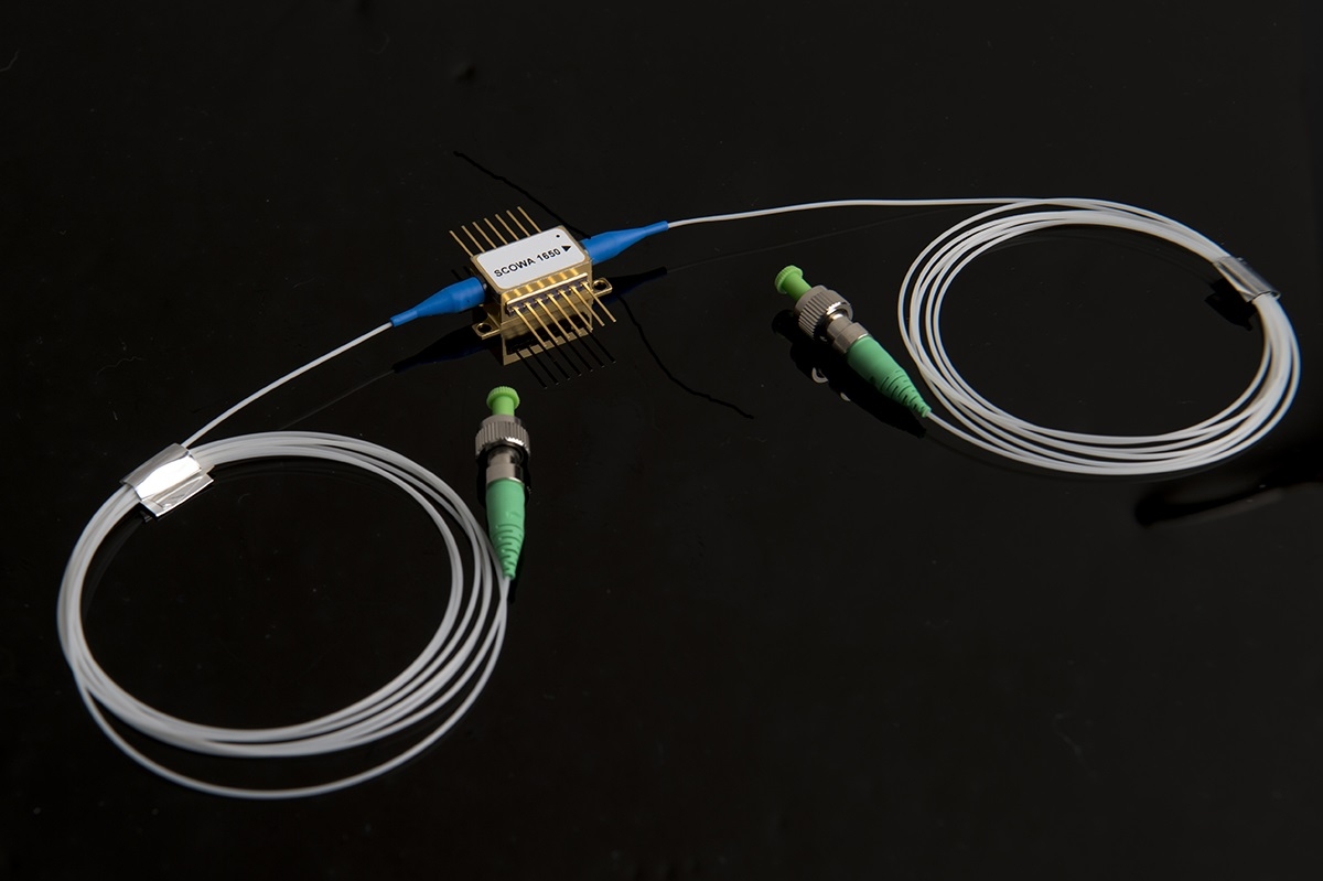 A packaged 1.65-micron slab-coupled optical waveguide amplifier (SCOWA)