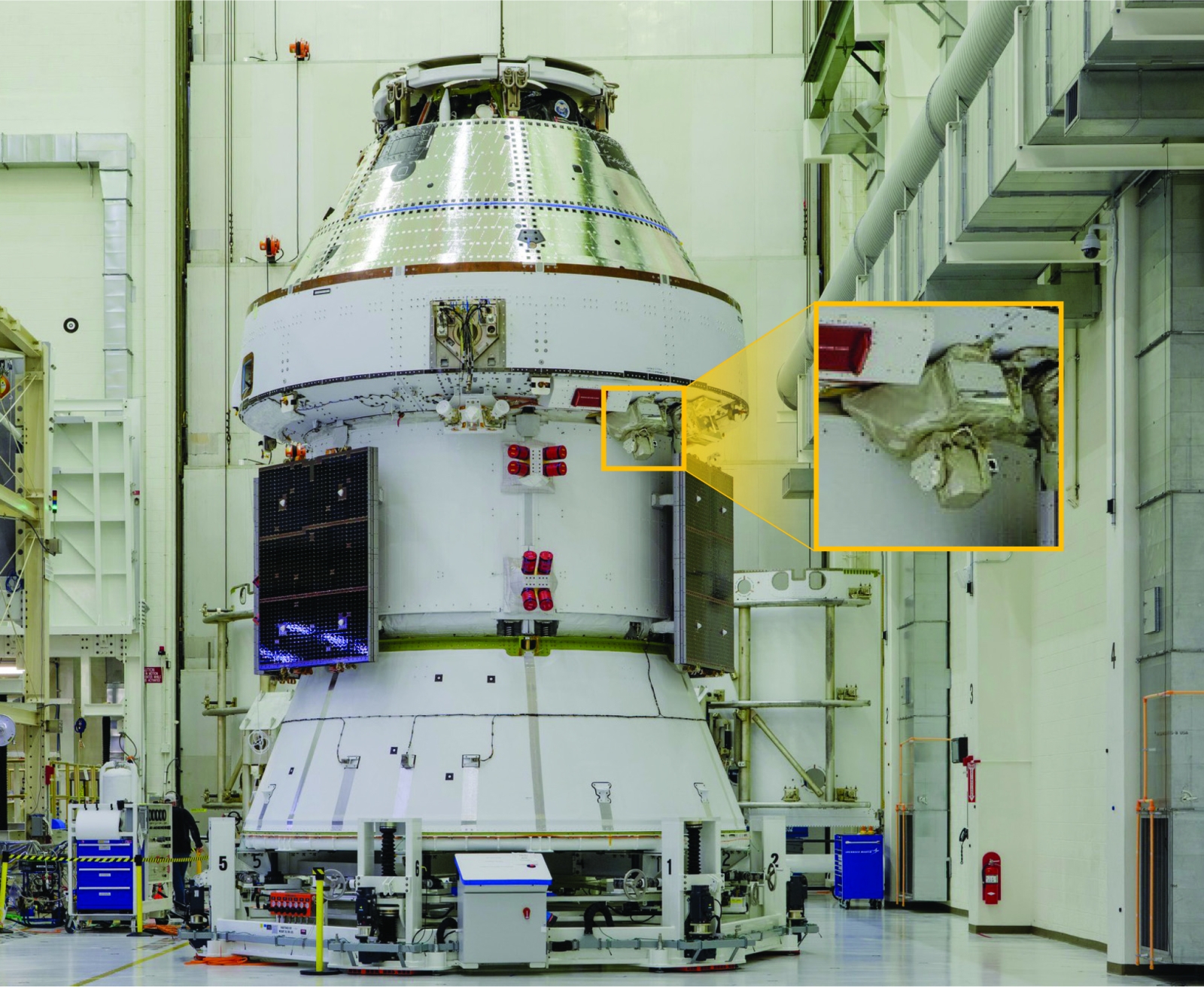 A photo of the Artemis II spacecraft is a spacecraft hangar. 