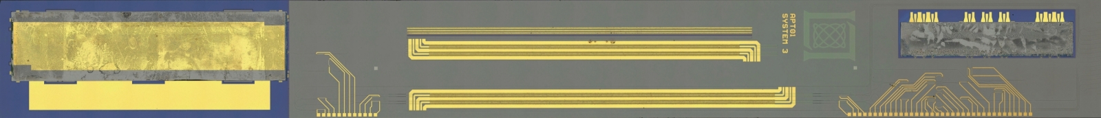 A close-up photo of microfabricated electronic and photonic circuit components. 