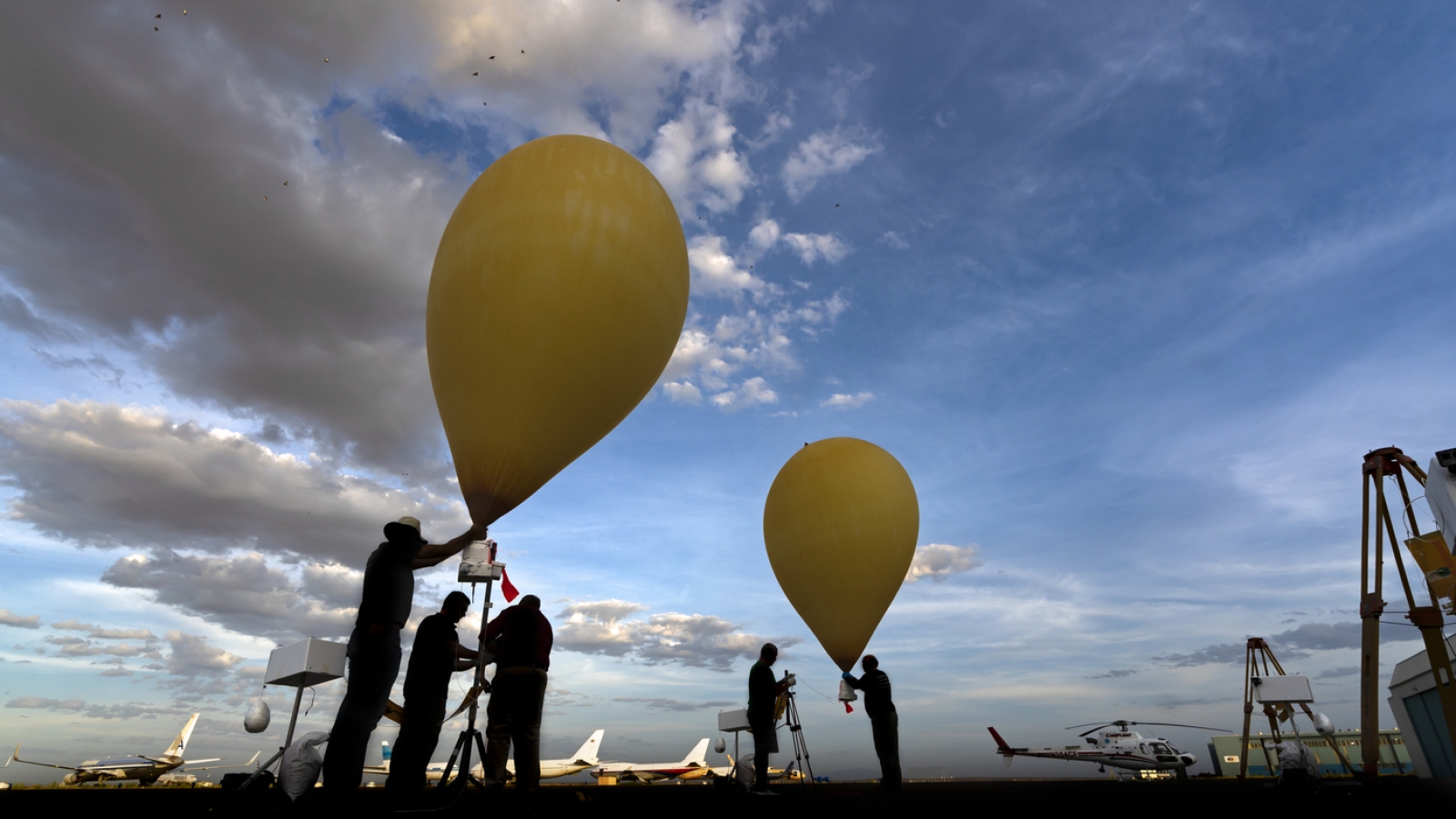 Photo of researchers launching the weather balloons