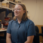 Ivy Mahncke sits in front of the camera.