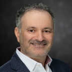 A formal portrait of Roger Khazan