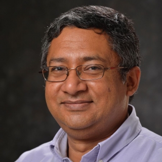 This is a headshot photo of Sanjeev Mohindra.