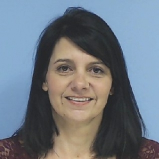 This is a headshot photo of Kim Tanguay.