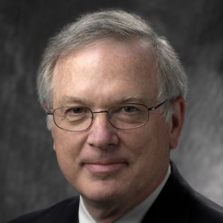 A photo of Dennis J. Keane.