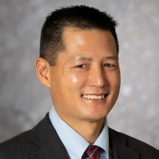 A portrait photo of Alan Hsu.