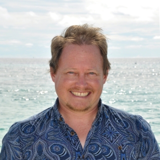 A photo of Justin J. Stambaugh.